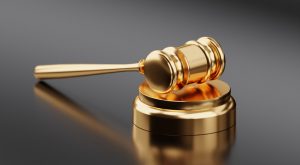 Pine Valley Fraud Defense Attorney Canva Golden Hammer and Gavel 300x165